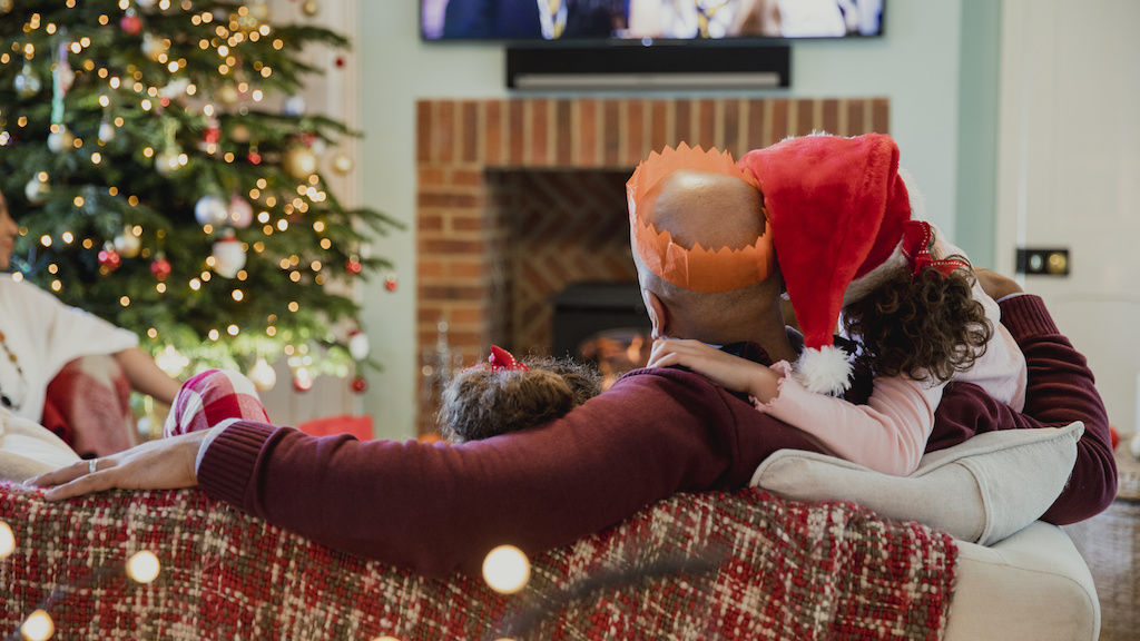 Family watching holiday movie